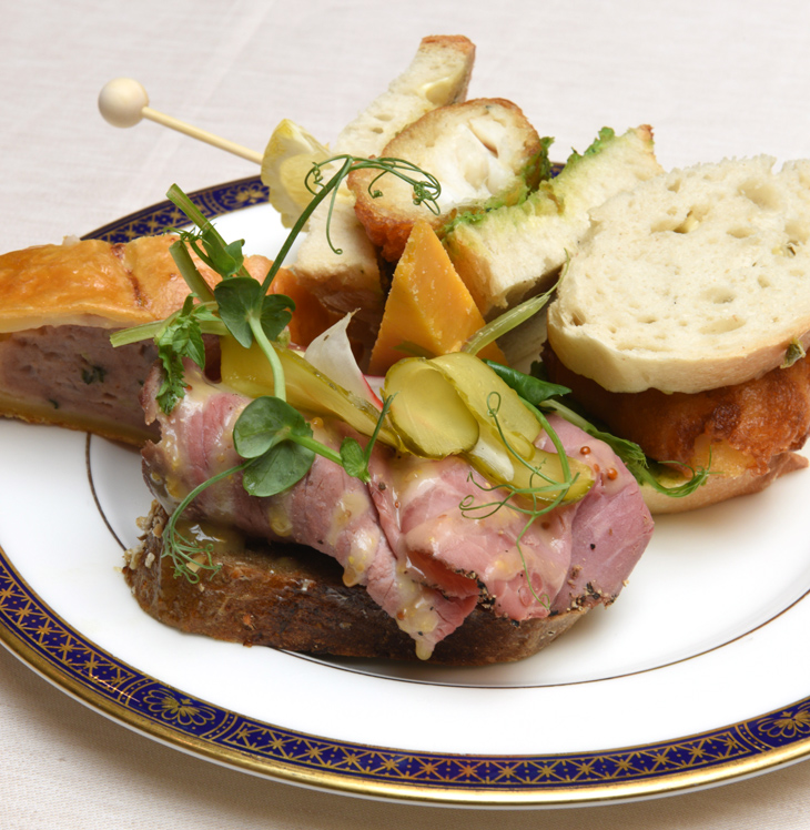 Floured bloomer, crispy haddock, tartar sauce Open rye, roast beef, pastrami, mustard and pickles Baked pork and apple savoury, Appleby’s Cheshire cheese